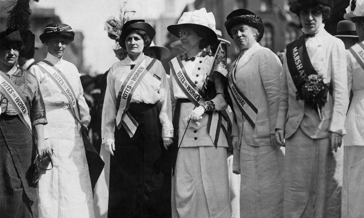 Inez Haynes Gillmore, Hildegarde Hawthorne, Edith Ellis Furness, Rose Young, Katherine Licily and Sally Splint represent female authors, dramatists and editors during a New York women’s suffrage parade.
