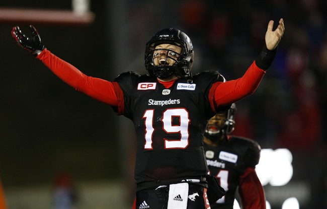Calgary Stampeders' quarterback Bo Levi Mitchell reacts after his touchdown throw against the B.C. Lions during fourth quarter CFL Western Final football action in Calgary, Sunday, Nov. 20, 2016.