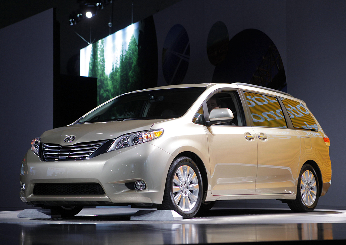 In this Dec. 2, 2009 file photo, the 2011 Toyota Sienna debuts at the Los Angeles Auto Show in Los Angeles.