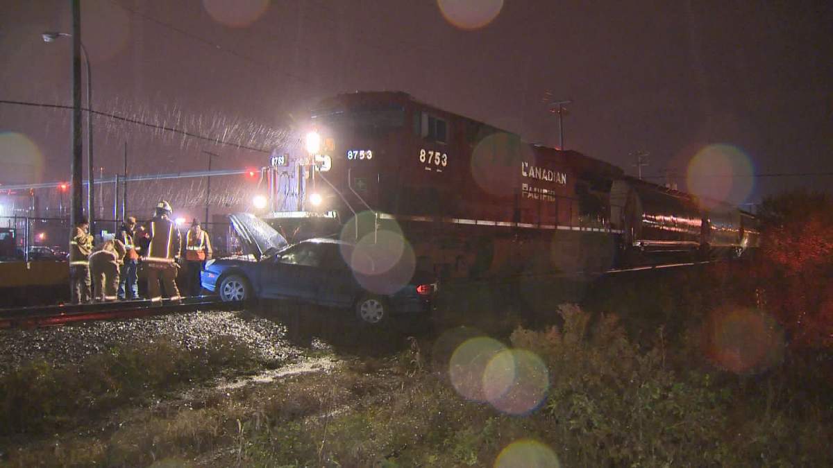 A car collided with a cargo train in Lachine near Fairway street and 52nd Avenue, Friday, November 11, 2016.