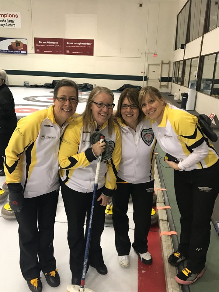 Tracy Andries' foursome pose after winning the 2016 Travelers Curling Club Women's Championship in Kelowna, BC.