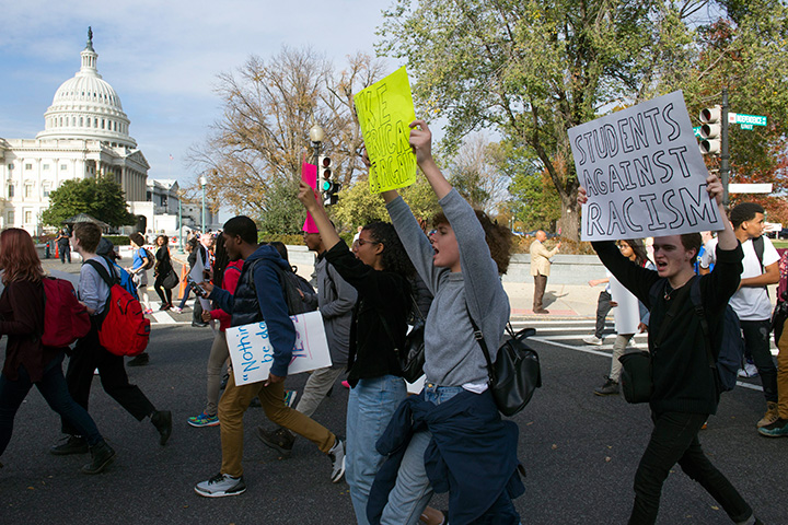 Demonstrators protesting president-elect Donald Trump walk past the Capitol in Washington, Tuesday, Nov. 15, 2016. 