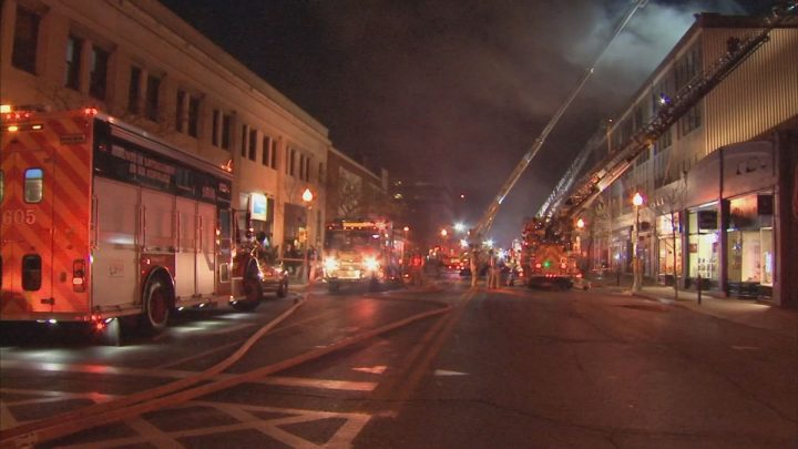 Firefighters battle a five-alarm blaze in a four-storey building in Westbound late Sunday evening, Nov. 13, 2016.