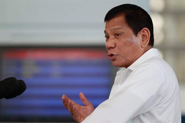 Philippine President Rodrigo Duterte gestures during his speech at Manila's International Airport, Philippines on Wednesday, Nov. 9, 2016. Duterte, who has lashed out at Barack Obama for criticizing his deadly anti-drug crackdown, congratulated U.S. President-elect Donald Trump Wednesday and said he looks forward to working with the new American leader to further enhance the treaty allies' relations. (AP Photo/Aaron Favila).