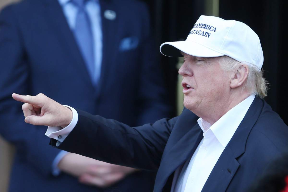  In this June 24, 2016 file photo, Republican presidential candiadte Donald Trump speaks as he arrives at his revamped Trump Turnberry golf course in Turnberry Scotland.