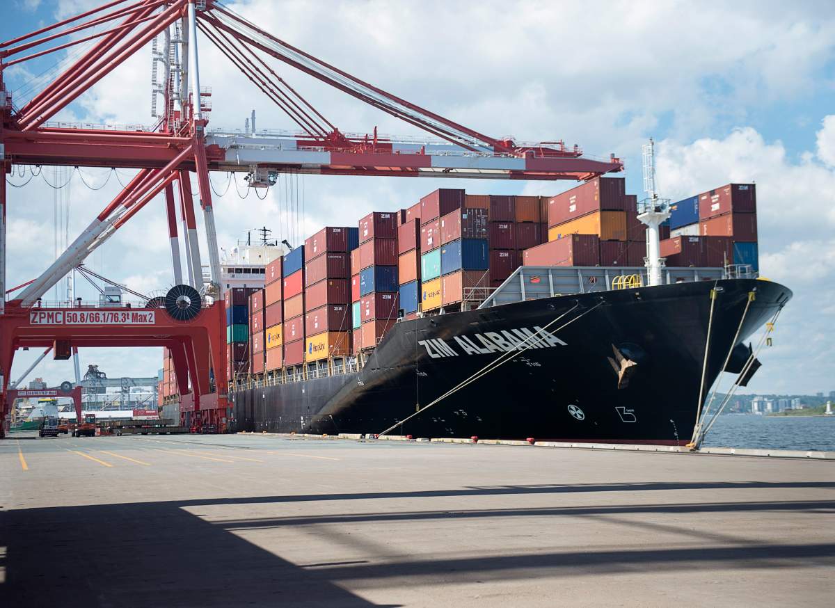 FILE - The container ship Zim Alabama unloads at the South End Container Terminal in Halifax on Wednesday, July 27, 2016.