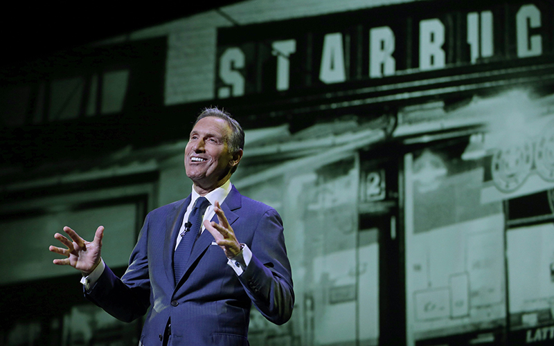 Starbucks CEO Howard Schultz speaks at the coffee company's annual shareholders meeting in Seattle. 