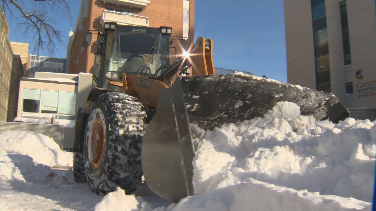 City crews work to clear snow.