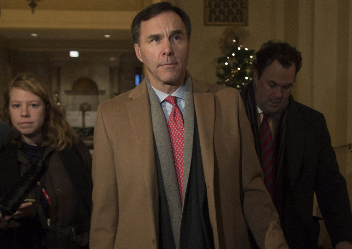 Minister of Finance Bill Morneau makes his way to meet with provincial counterparts at the Finance Ministers meeting in Ottawa, Monday December 19, 2016. 