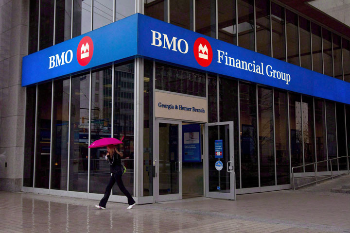 A woman leaves a Bank of Montreal branch