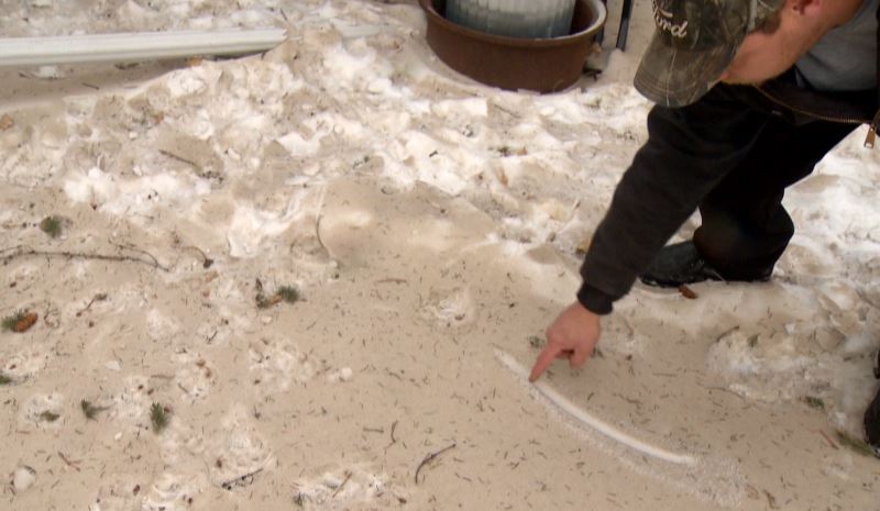 Dirt blows into Michael Hauk's yard after 100 km/h wind gusts were felt in Lethbridge.