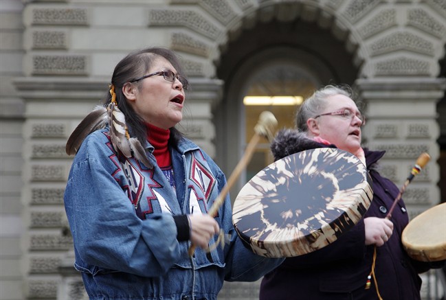 Marcia Brown Martel (left) is seen outside court in Toronto on Thursday, Dec. 1, 2016. Brown Martel is representative plaintiff in the 60s Scoop class action that alleges the federal government failed to protect the cultural identities of aboriginal children placed in non-aboriginal homes in Ontario between December 1965 and December 1984. 