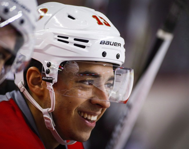 Calgary Flames' Johnny Gaudreau skates with the team during a practice session in Calgary, Tuesday, Oct. 11, 2016.