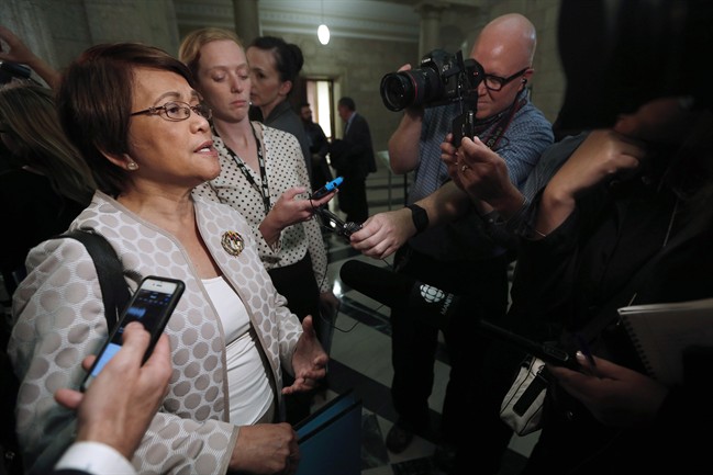 Manitoba's interim NDP leader Flor Marcelino speaks to media after the provincial budget is read in the Manitoba Legislature in Winnipeg, Tuesday, May 31, 2016. Manitoba's opposition parties will spend much of their time in 2017 trying to find new leaders that can mend rifts, raise much-needed money and put together teams that might be more competitive in the next provincial election.