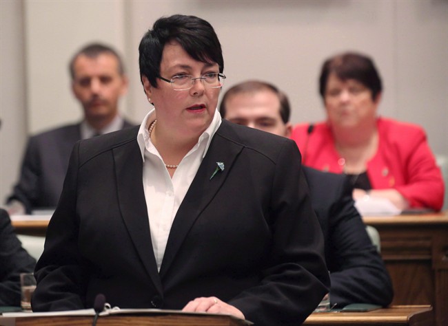 Newfoundland and Labrador Finance Minister Cathy Bennett presents the 2016 provincial budget at the legislature in St.John's, Thursday, April 14, 2016. Bennett says she has been repeatedly attacked online with death threats, body shaming and bullying ??? and it must stop.
