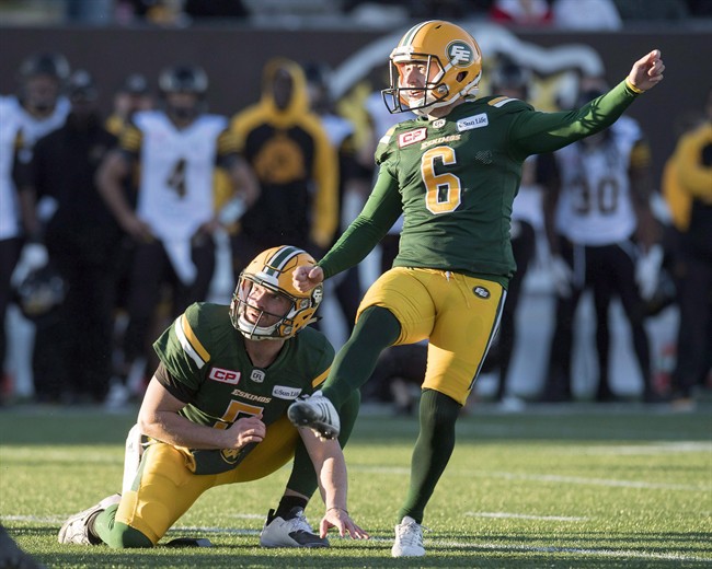 Edmonton Eskimos' kicker Sean Whyte (6) and quarterback Jordan Lynch watch the game winning field goal against the Hamilton Tiger-Cats in CFL playoff action, in Hamilton, Ont., on Sunday, November 13, 2016. 
