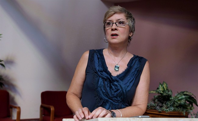 Rev. Gretta Vosper is seen at her West Hill United Church in Toronto on Wednesday, Aug. 5, 2015. 