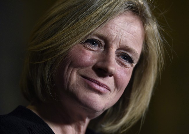 File: Alberta Premier Rachel Notley speaks to reporters during a media availability on Parliament Hill, Tuesday, Nov. 29, 2016 in Ottawa. 