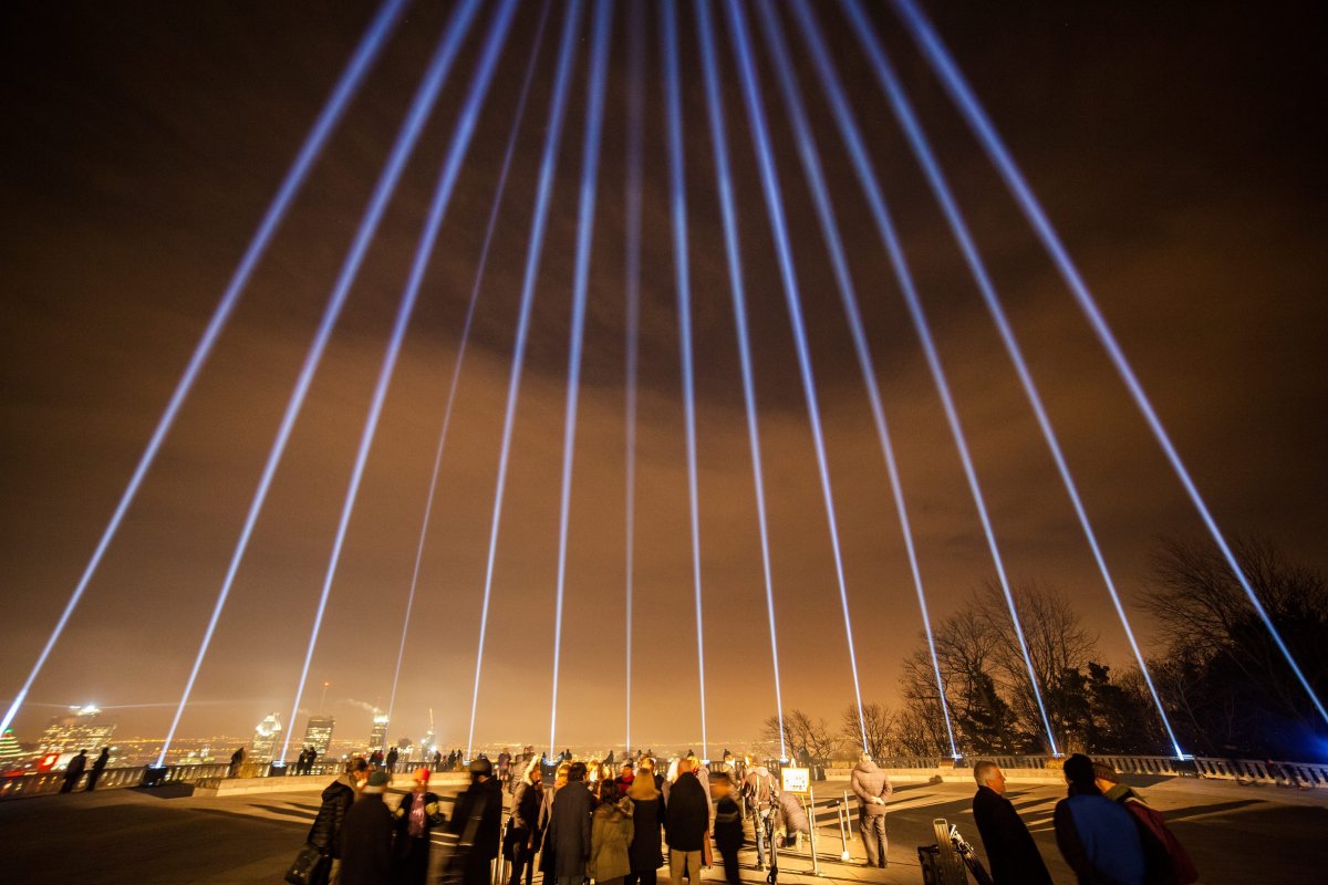 14 beams of light are lit on Mont Royal in Montreal on Decembre 6, 2015 to commemorate the 14 women killed in 1989 during the Ecole Polytechnique massacre.