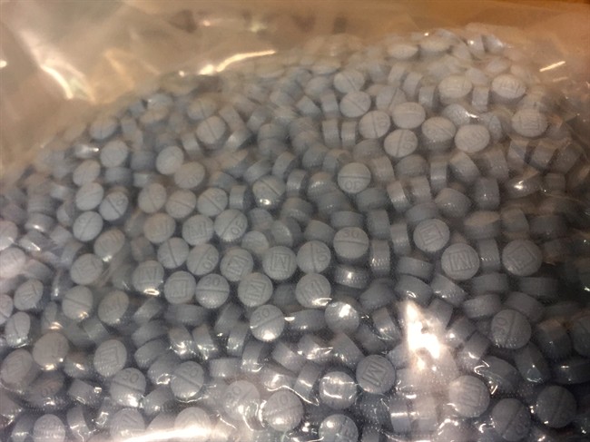 Fentanyl pills seized by Calgary police are shown in a handout photo. 