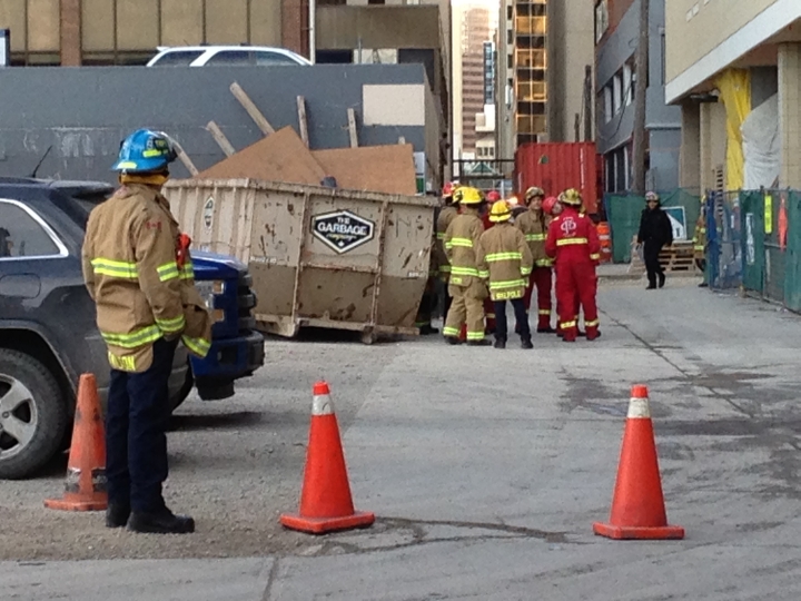 Calgary emergency crews at scene of scaffolding collapse - Dec 22, 2016.
