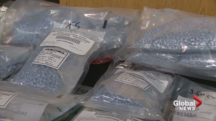 Calgary police display some of the pills seized in the city's largest fentanyl seizure in December 2016.
