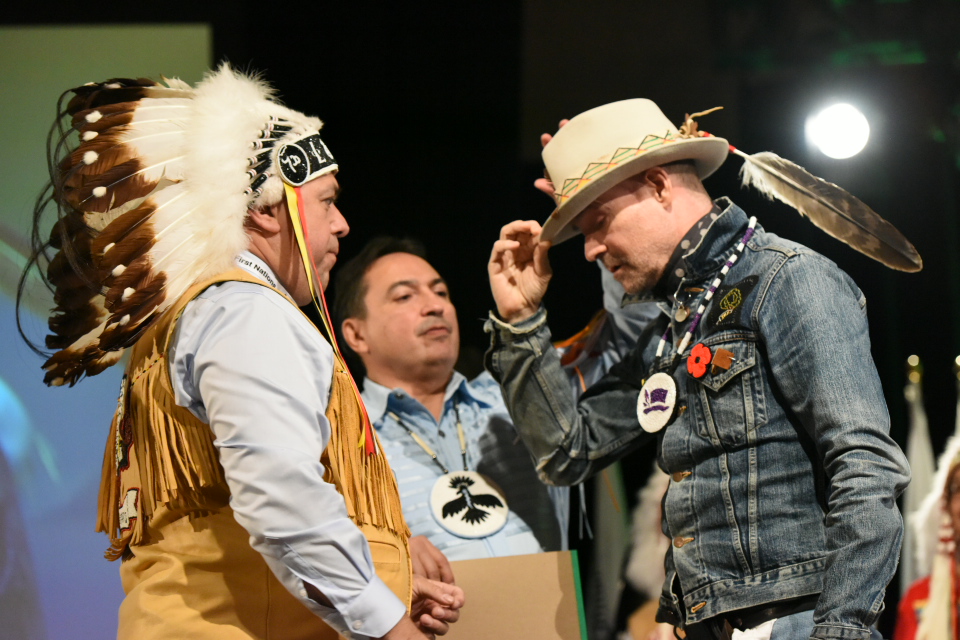 Gord Downie is seen here wearing the beadwork medallion featuring his iconic hat presented to him by Regional Chief Morley Googoo at a AFN ceremony Tuesday.