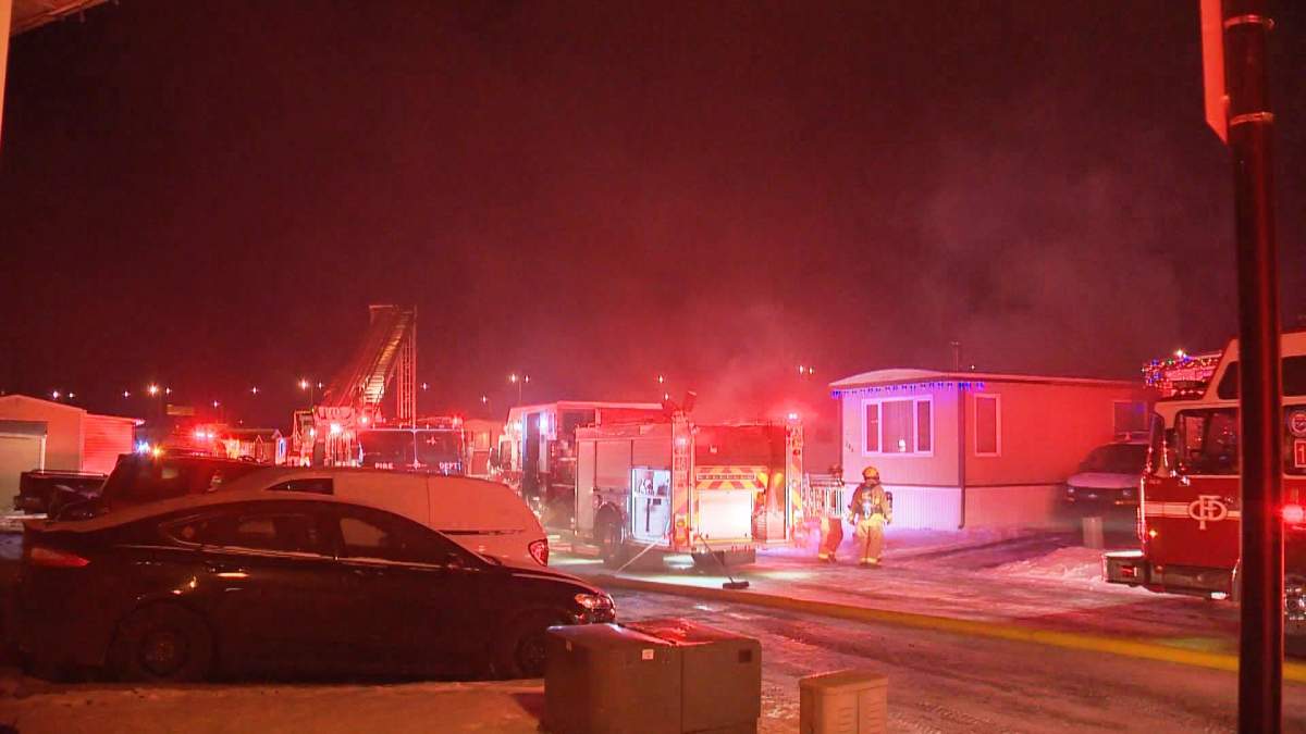 Fire crews respond to a fire at Chateau Estates, located in the 1100 block of 84 Street N.E., at around 7:30 p.m. on Tuesday, Dec. 13, 2016. 