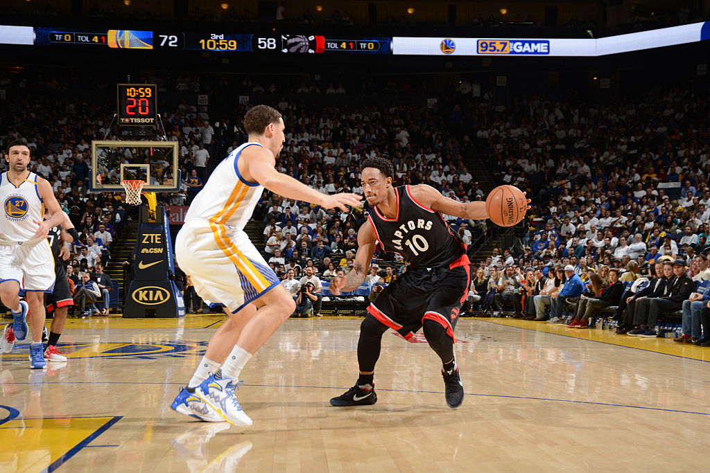 DeMar DeRozan #10 of the Toronto Raptors handles the ball during a game against the Golden State Warriors on December 28, 2016 at ORACLE Arena in Oakland, California. (Photo by Noah Graham/NBAE via Getty Images).