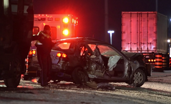 Three people were hurt following a crash between a tractor trailer and car on Highway 401 in Ajax on Dec. 30. 2016.