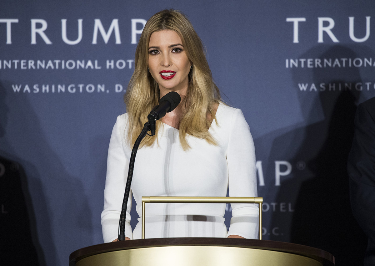 Ivanka Trump speaks as her father, Republican Presidential Candidate Donald Trump, stands with her on stage during the opening ceremony for the Trump International Hotel, Old Post Office, in Washington, USA on October 26, 2016.
