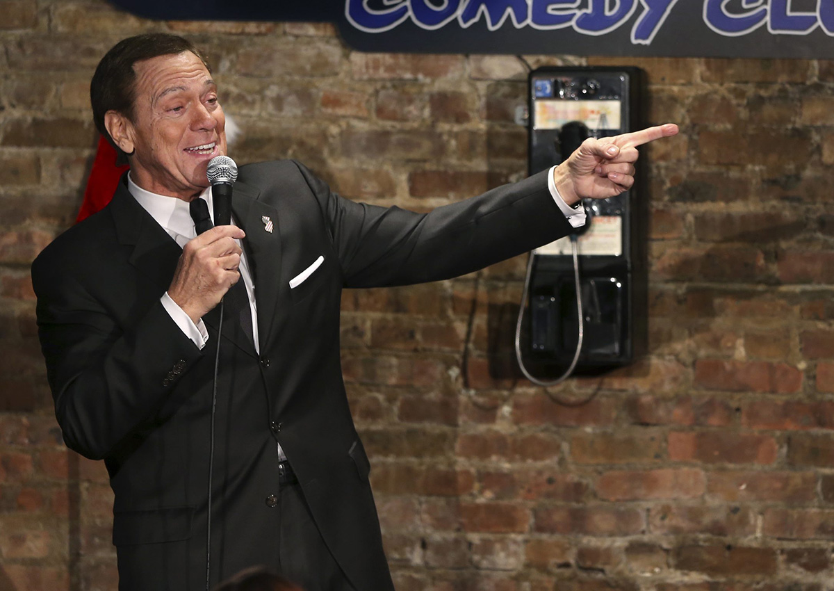 Joe Piscopo sings an updated "New York, New York,"  during an event to help raise funds for the Boys and Girls Club of America at the Stress Factory Comedy Club Tuesday, Dec. 6, 2016, in New Brunswick, N.J. 