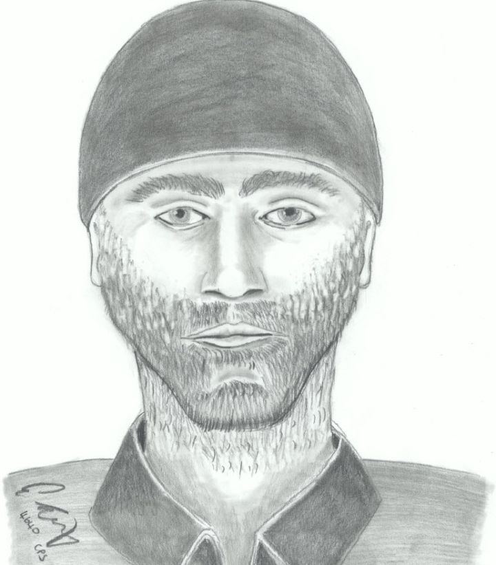 The suspect in a Tuscany robbery is described as 5’10” with a slim build and a beard. 
