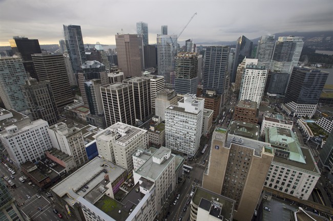 Tough new mortgage rules may not be enough to put a dent in sky-high prices in Vancouver and Toronto. 
