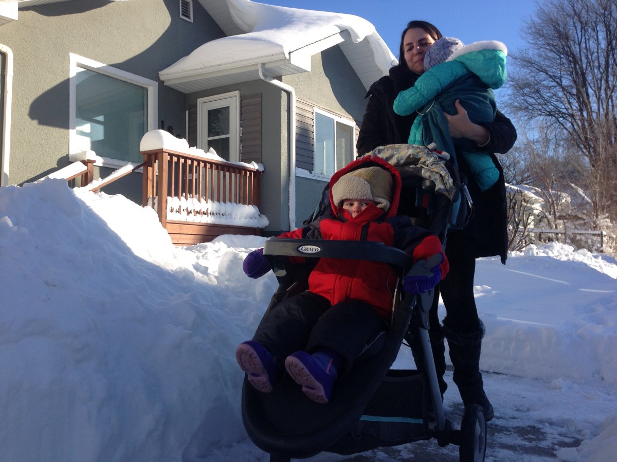Alysa Friesen delivers mail to her neighbours, after finding wrong addresses in mailbox.