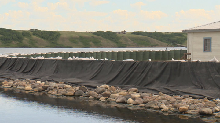 A berm at Manitou Beach, Sask. The village is getting a $150,000 helping hand from the Mosaic Company to build a berm to hold back flood waters.