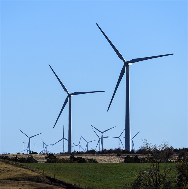 This photo provided by Google shows windmills at a wind farm in Minco, Okla., that provides Google with some of its renewable energy. 