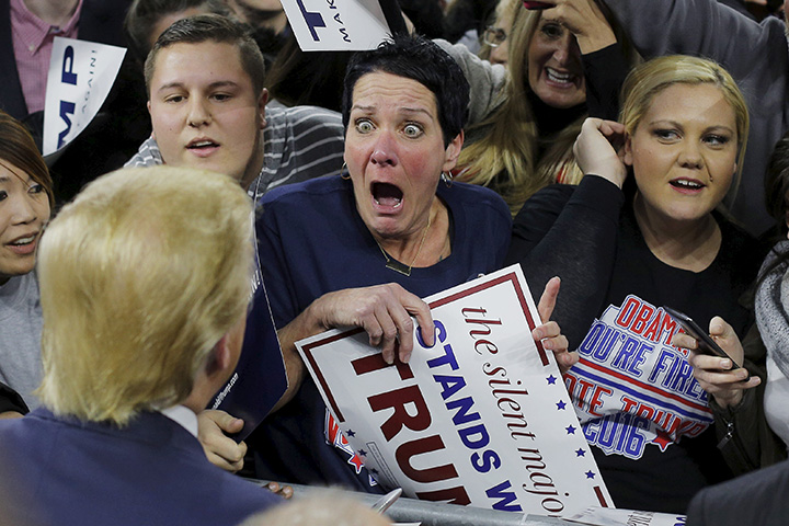 An audience member reacts as U.S. Republican presidential candidate Donald Trump greets her at a campaign rally in Lowell, Massachusetts on Jan. 4, 2016.