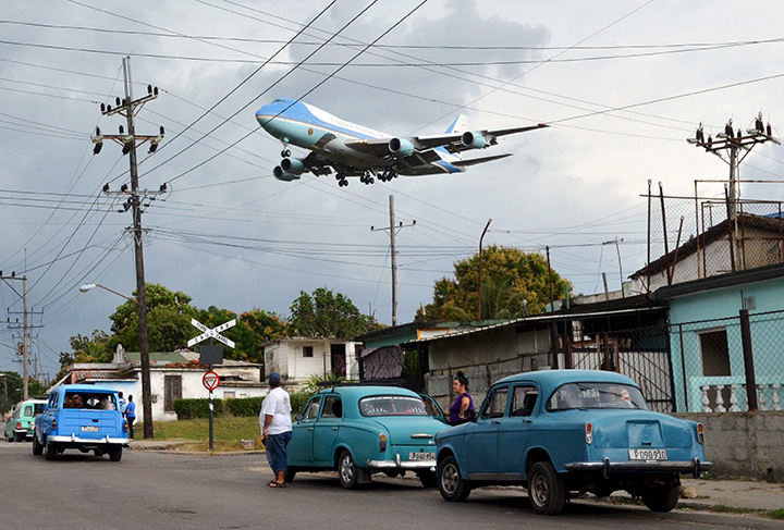 Air Force One, carrying U.S. President Barack Obama and his family, flies over a neighbourhood in Havana, Cuba on March 20, 2016.