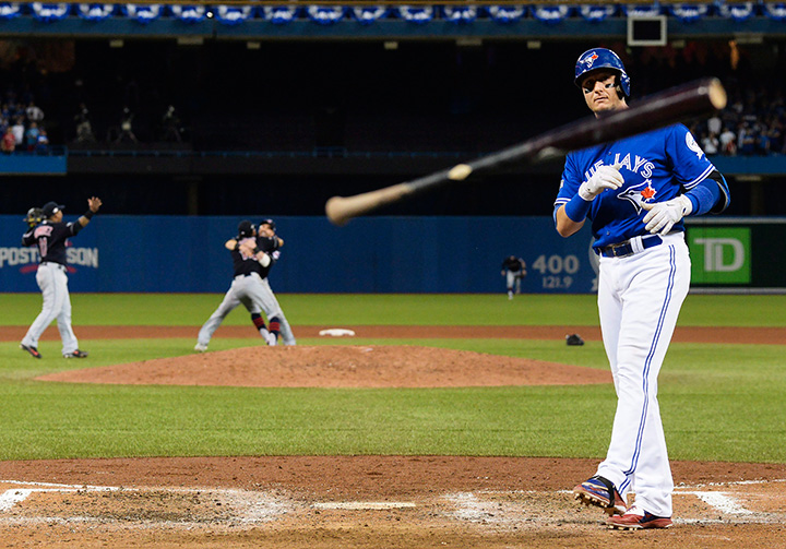 Toronto Blue Jays’ Troy Tulowitzki throws his bat after making the final out in Game 5 of the American League Championship Series against the Cleveland Indians in Toronto on Oct. 19, 2016.