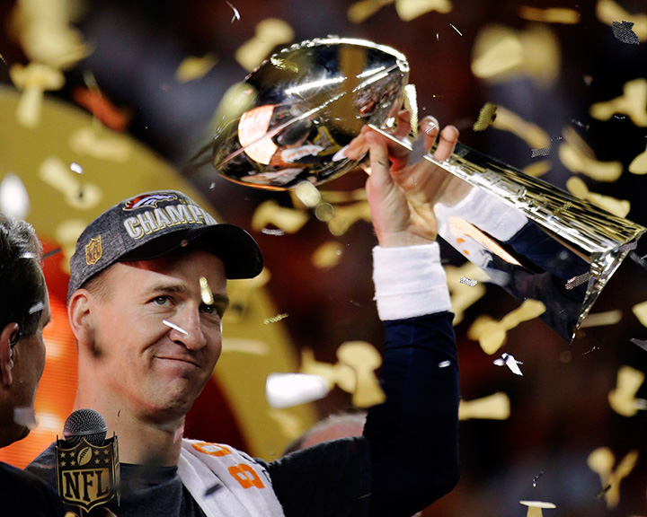 Denver Broncos’ Peyton Manning holds up the trophy after winning Super Bowl 50 on Feb. 7, 2016, in Santa Clara, Calif.