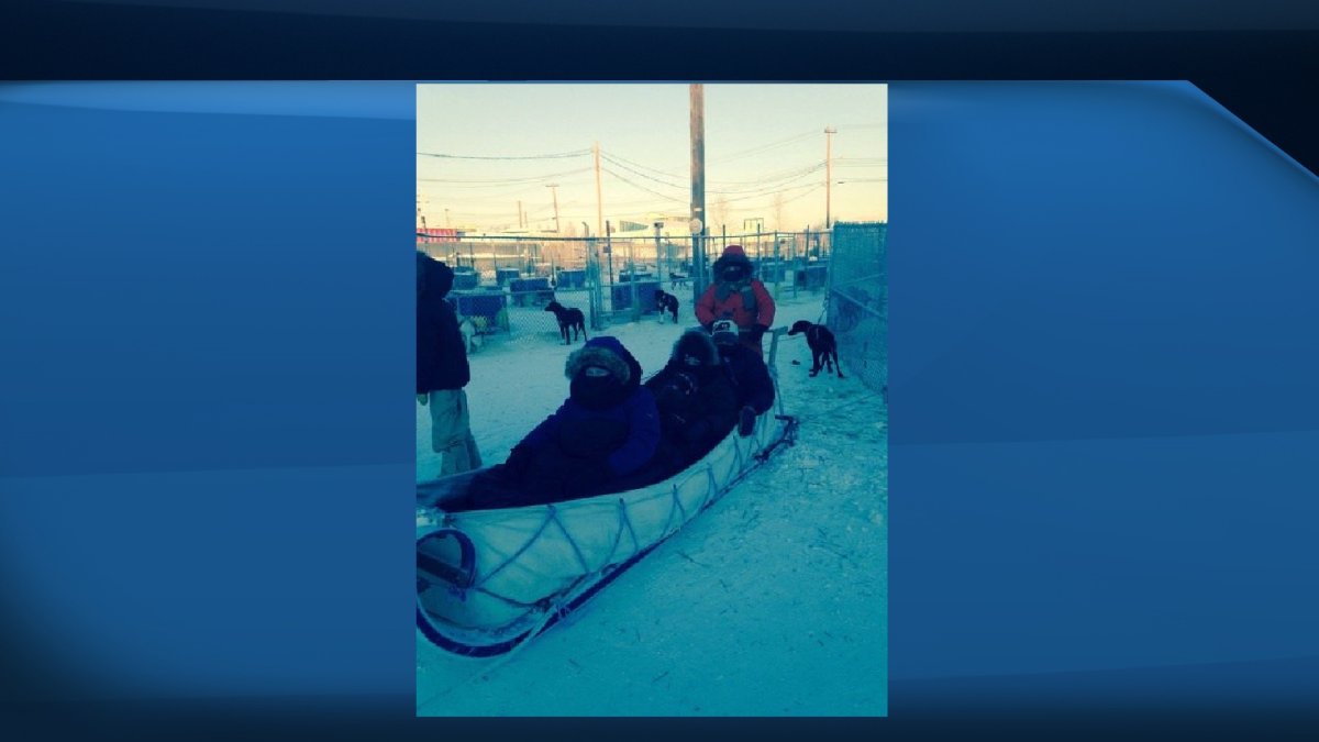 Rheanna Trepanier and her family on a dog sled in Yellowknife, NWT, on Sunday, December 18, 2016. 