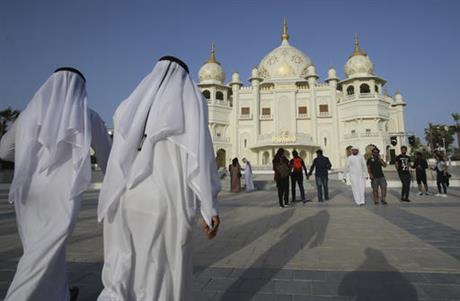 People visit the Rajmahal building at Dubai Parks & Resorts in Dubai, United Arab Emirates, Sunday, Dec. 18, 2016.