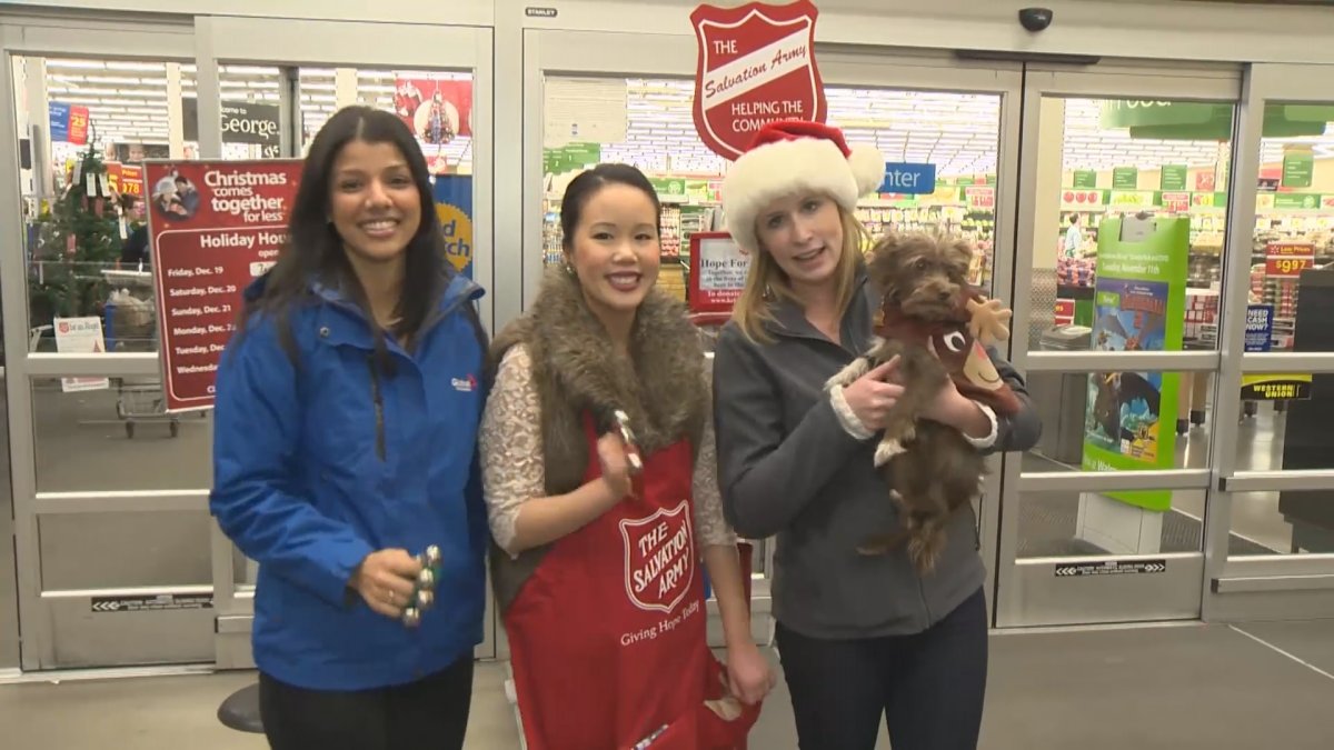 Neetu Garcha, Angela Jung and Lauren Pullen ring the bells for the Salvation Army kettle at Walmart in Kelowna in 2014.
