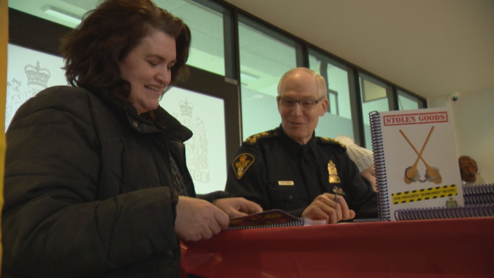 The Saskatoon Food Bank got an early Christmas present from the police force – proceeds from a cookbook.