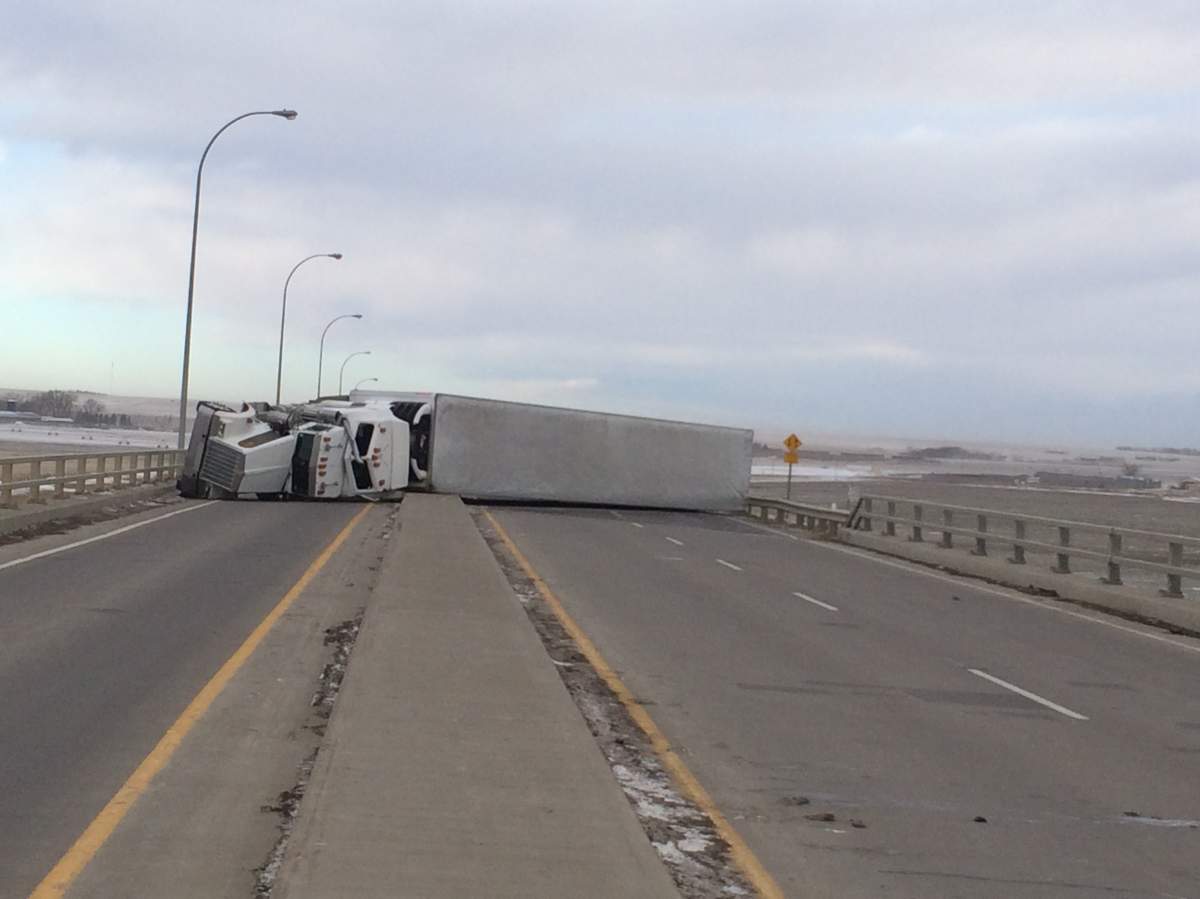 ‘Extreme wind’ causes multiple semi-trailers to be blown over on Alberta highways - image