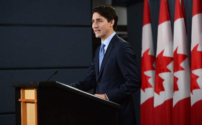 Prime Minister Justin Trudeau holds a press conference at the National Press Theatre in Ottawa on Monday, Dec. 12, 2016. 
