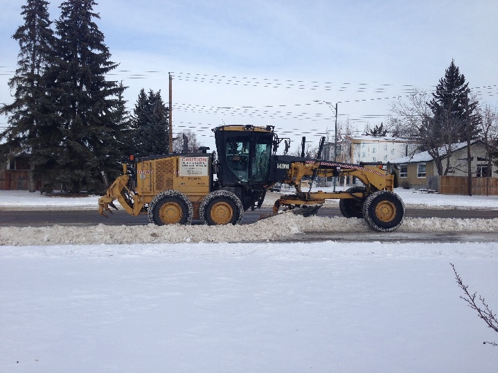 FILE: A snow plow clears Spruce Drive S.W. in Calgary's Wildwood neighbourhood.