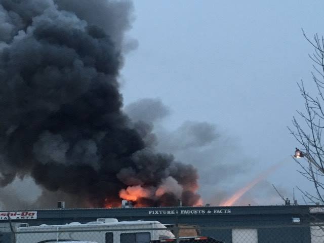 Strathcona County fire crews battle a massive fire at a commercial building in Sherwood Park Saturday afternoon.