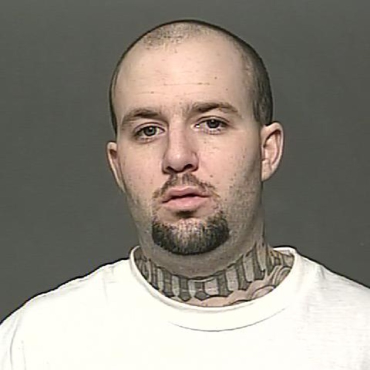 Michael Tylor Fless has been arrested in connection to two November shootings.